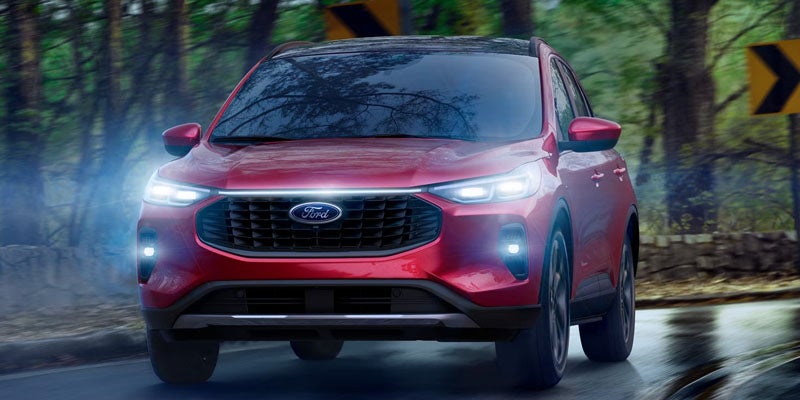 Red 2026 Ford Escape with headlights on sold at tooele ford in tooele utah