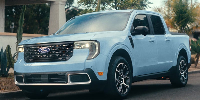 Ford Maverick, a compact pickup truck, showcasing its sleek design and robust features in a parking lot.